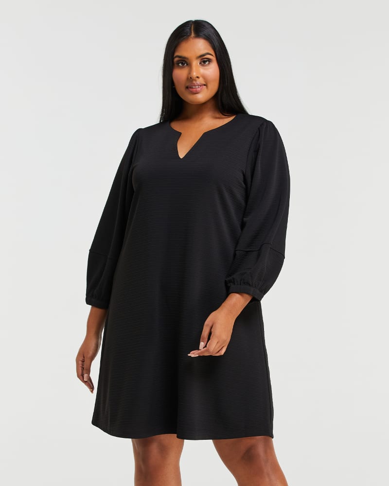 Front of a model wearing a size 1X Clara Dress in Black by Estelle. | dia_product_style_image_id:235142